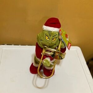Grinch Plush Toy with Trombone - Red and GreenThe Grivh animated Plush